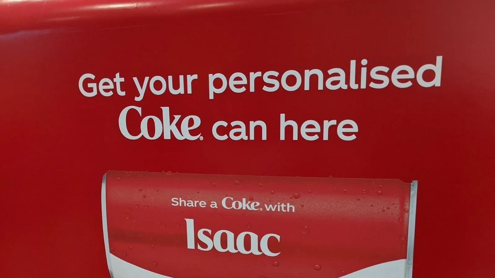 A Coca-Cola stand offering personalised Coke bottles.