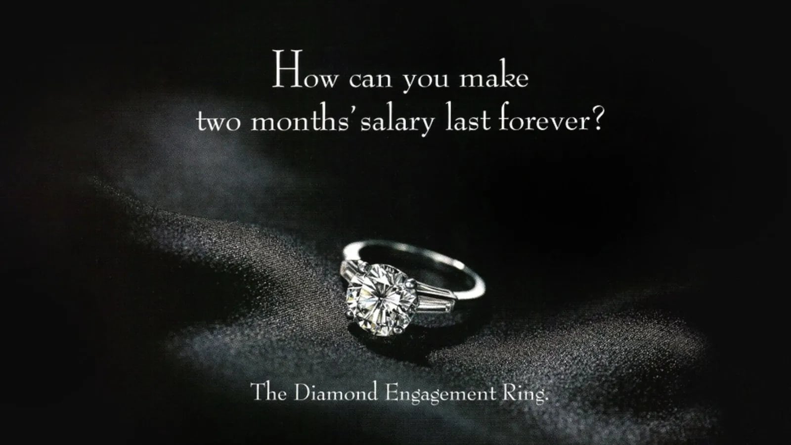 A vintage De Beers ad showing a diamond engagement ring.