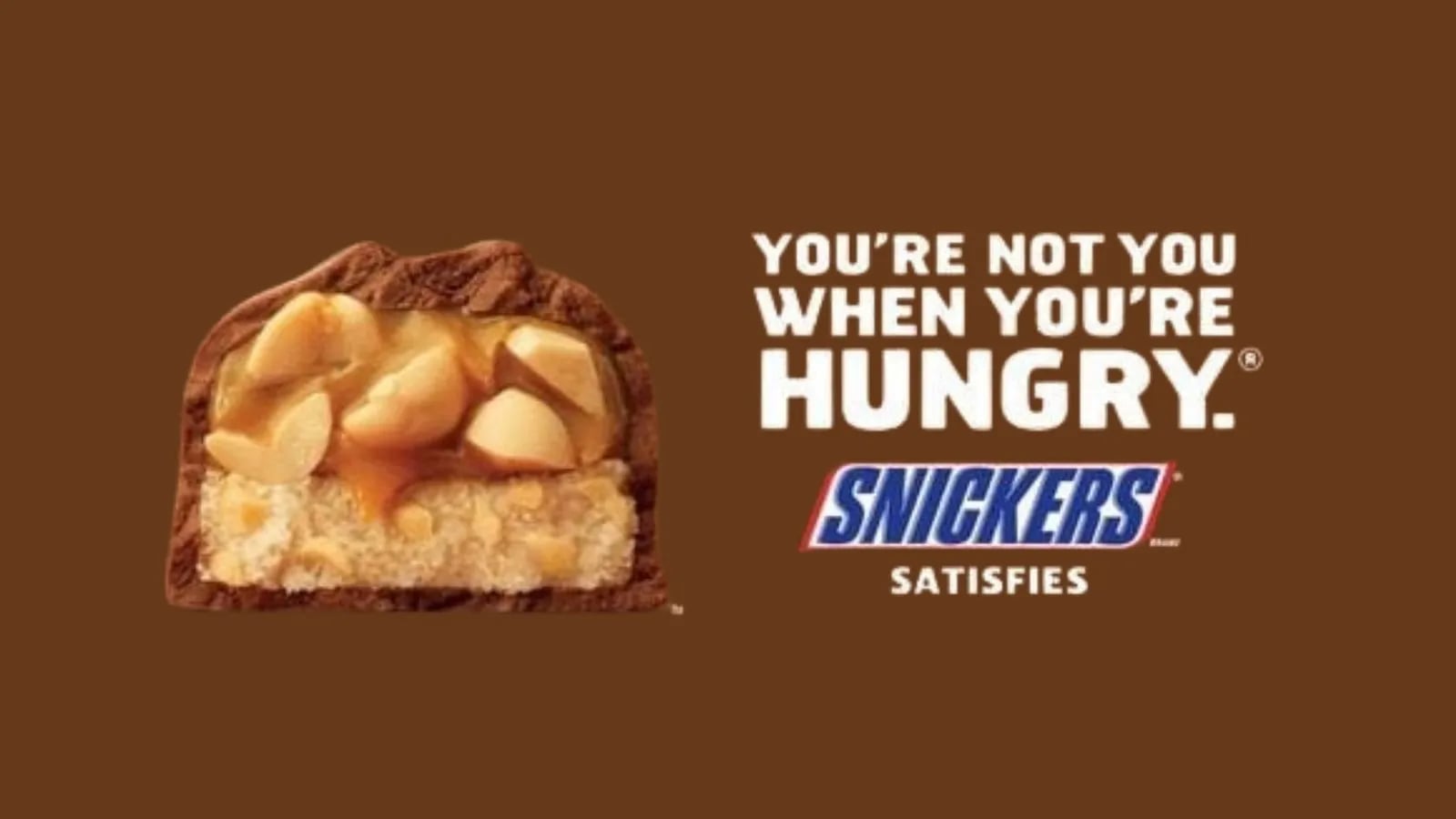 A Snickers bar beside the line You’re not you when you’re hungry.